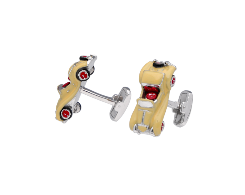 Pair of racing car wheel cufflinks on a white background