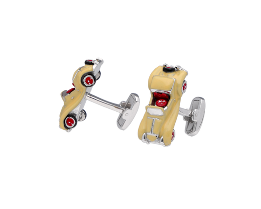Pair of racing car wheel cufflinks on a white background